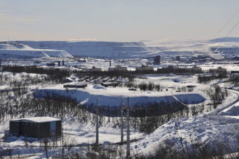 Kiruna iron mine overlooks the town of Kiruna. It is the world's largest underground iron ore mine, owned by Swedish state-owned company LKAB. The mine, which opened in 1900, has created a geological instability that is forcing the arctic town of Kiruna to relocate, little by little. Around 6,000 people will have been relocated to new housing three kilometers east of the old town by 2035.